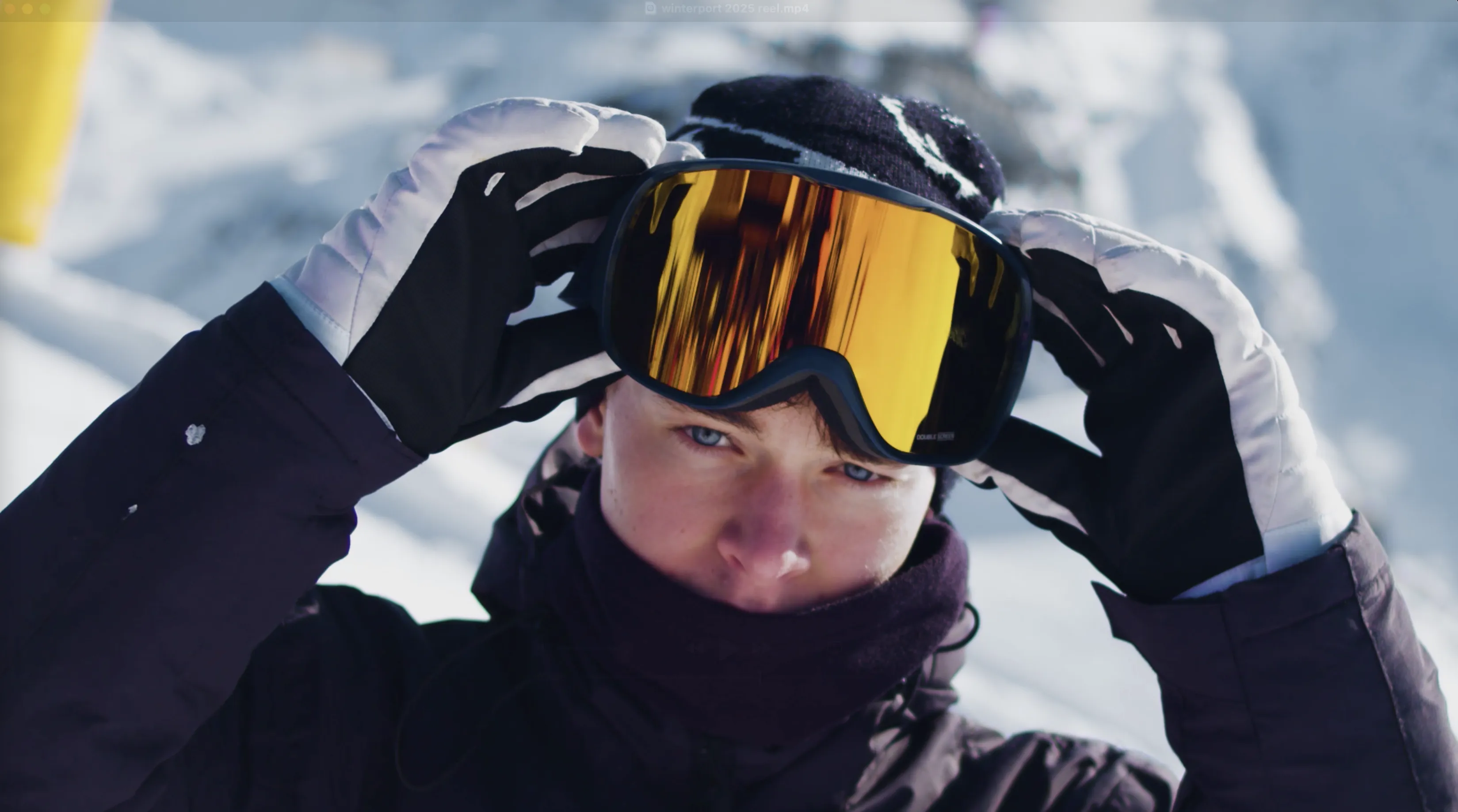 FPV drone footage of snowboarding and skiing in the mountains